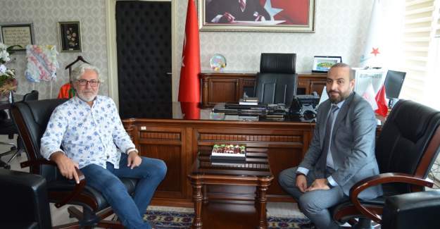 Aslan, Başhekim Karahan'a Hayırlı Olsun Ziyaretinde Bulundu